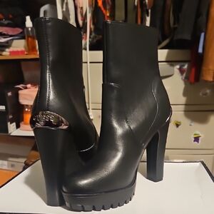 GUESS Black Heeled Boots with Silver Accent